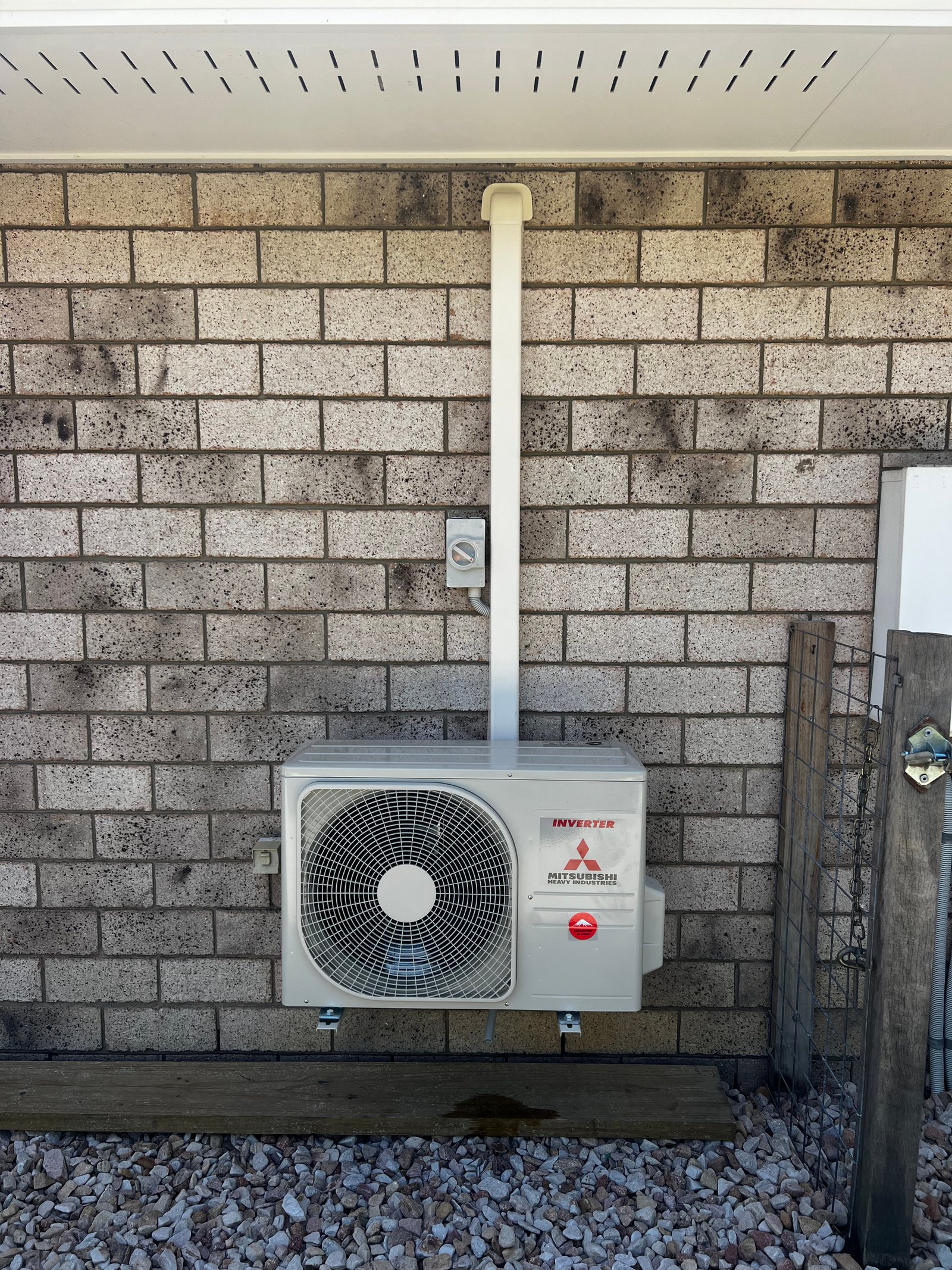 Finished residential split-system outdoor unit installation